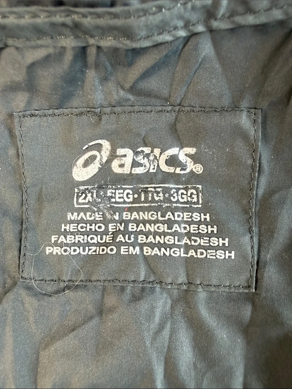 Asics packable jacket folds into pocket dark gray size XXL orange accents